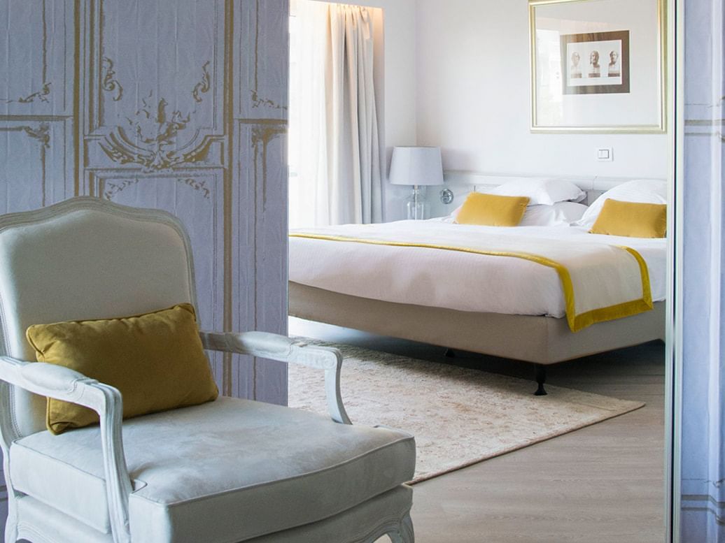 Interior of bedroom in Premiere Room at George Lycabettus
