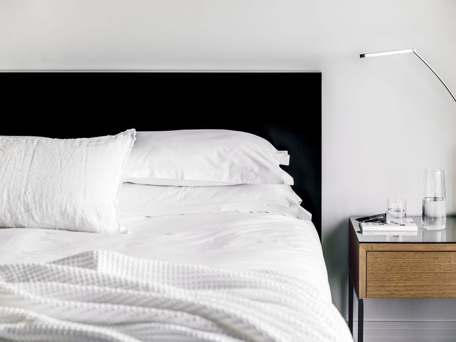 King bed & nightstand in Deluxe Room at The Como Melbourne