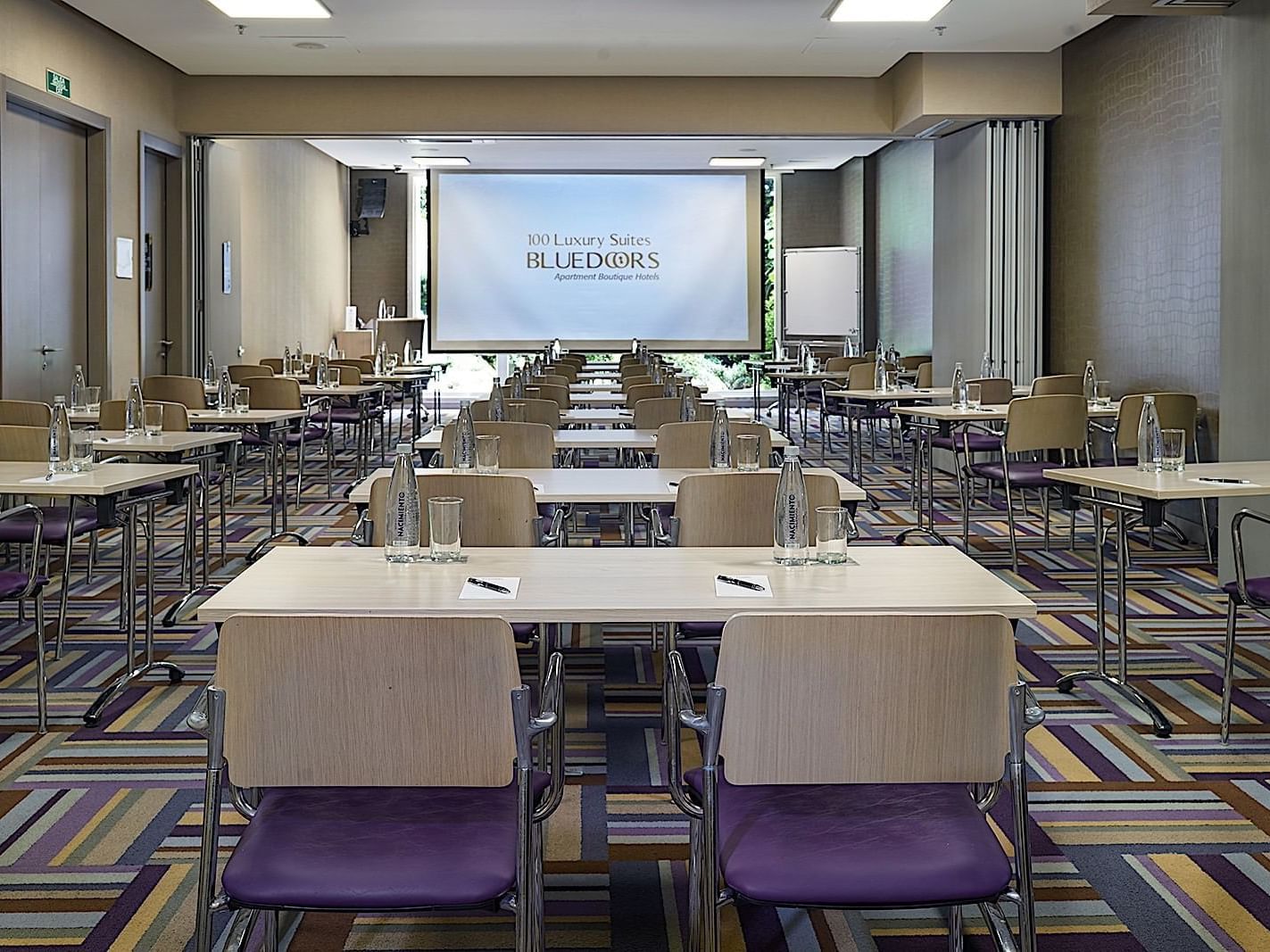 Classroom type setup in a meeting room at Blue Doors Hotels
