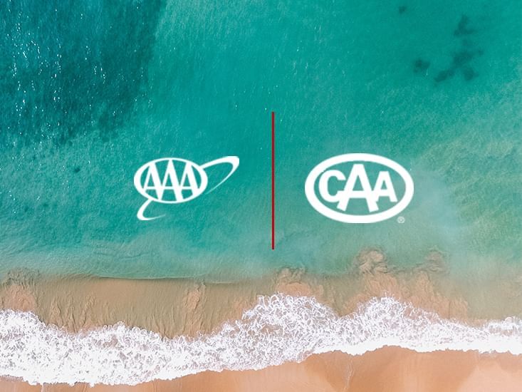 AAA & CAA logos with beach background at Clinton Hotel 