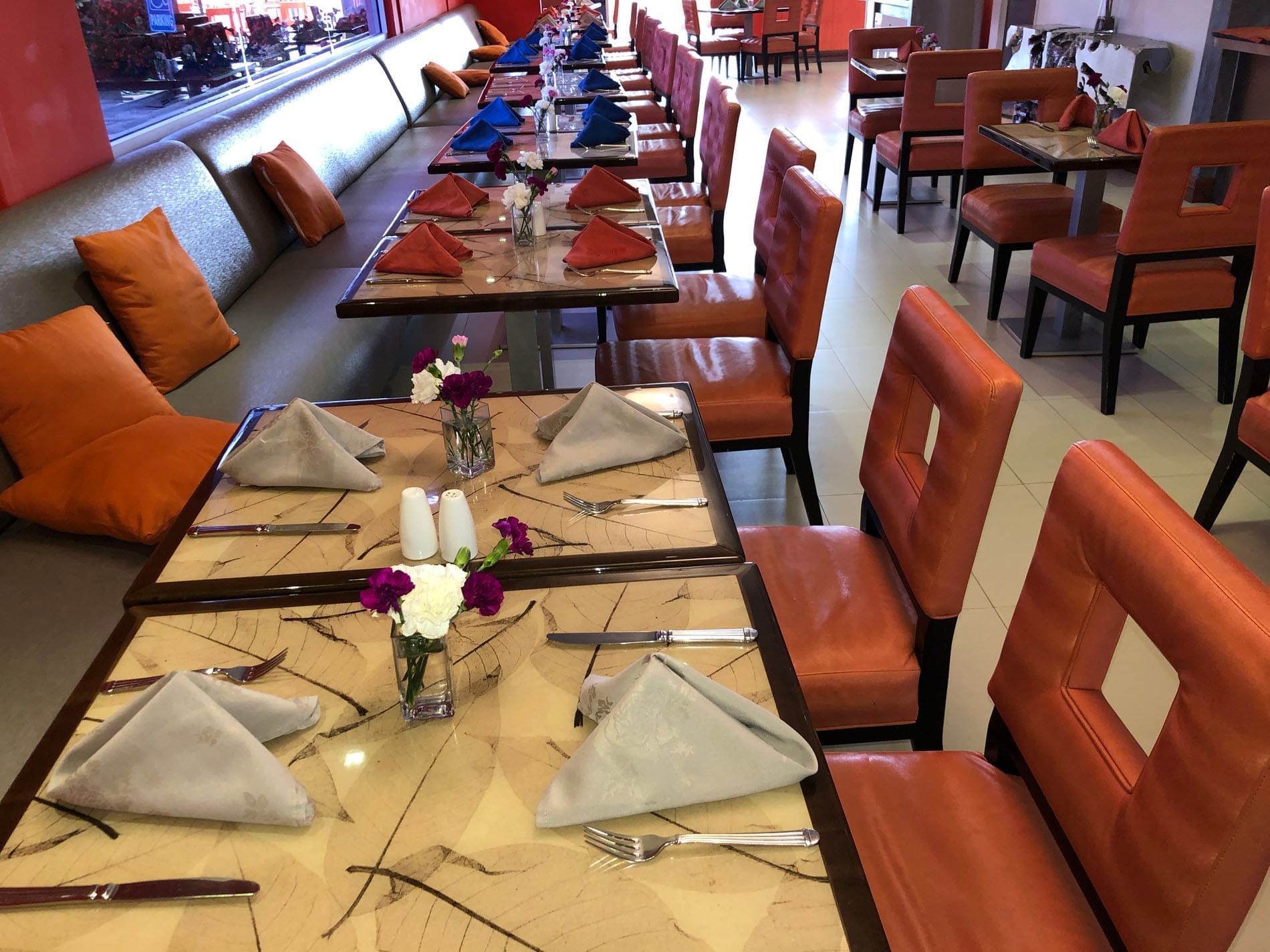 Table arranged with glasses & cutlery at Pegasus Hotel Guyana