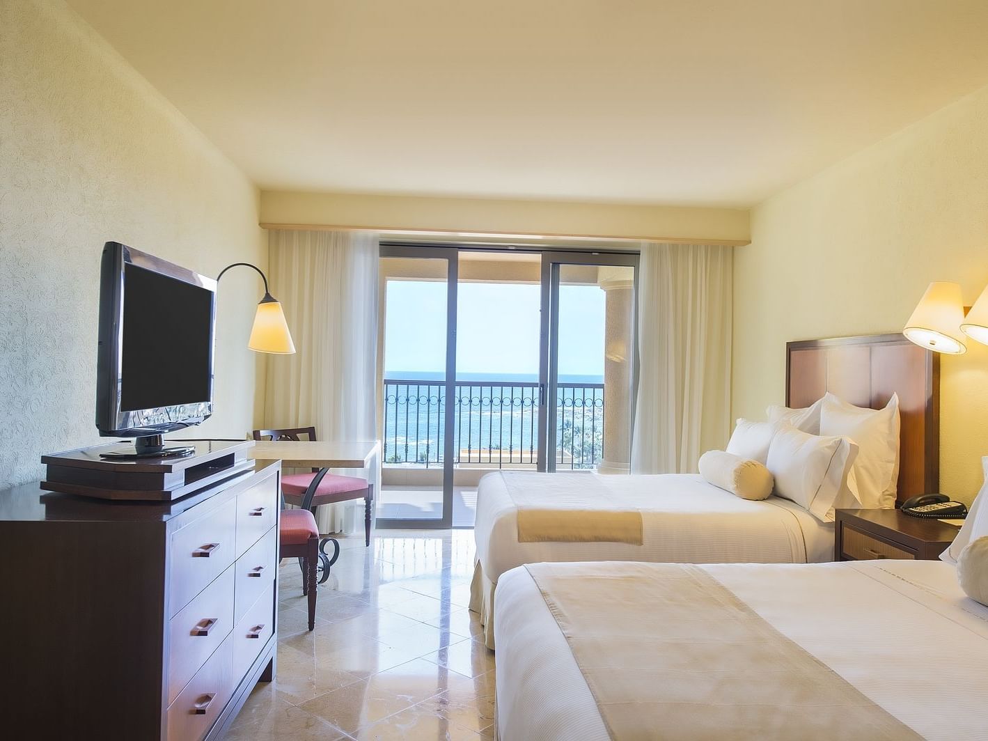 TV & 2 Double beds in Premier 4 Bedroom at Grand FA Los Cabos