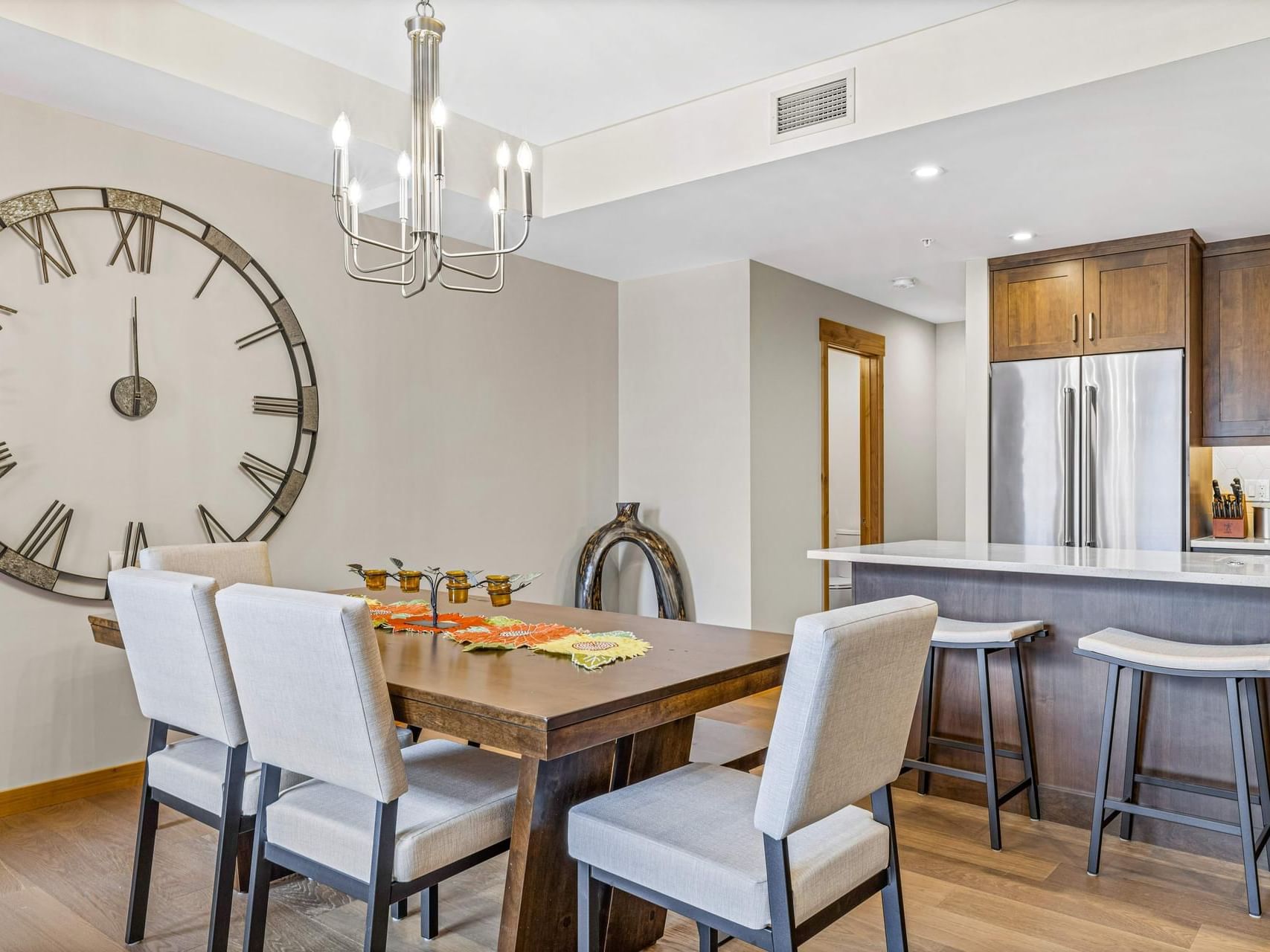 207B Tamarack Lodge Two Bedroom Premier Loft Condo dining area with adjacent kitchen at Spring Creek Vacations