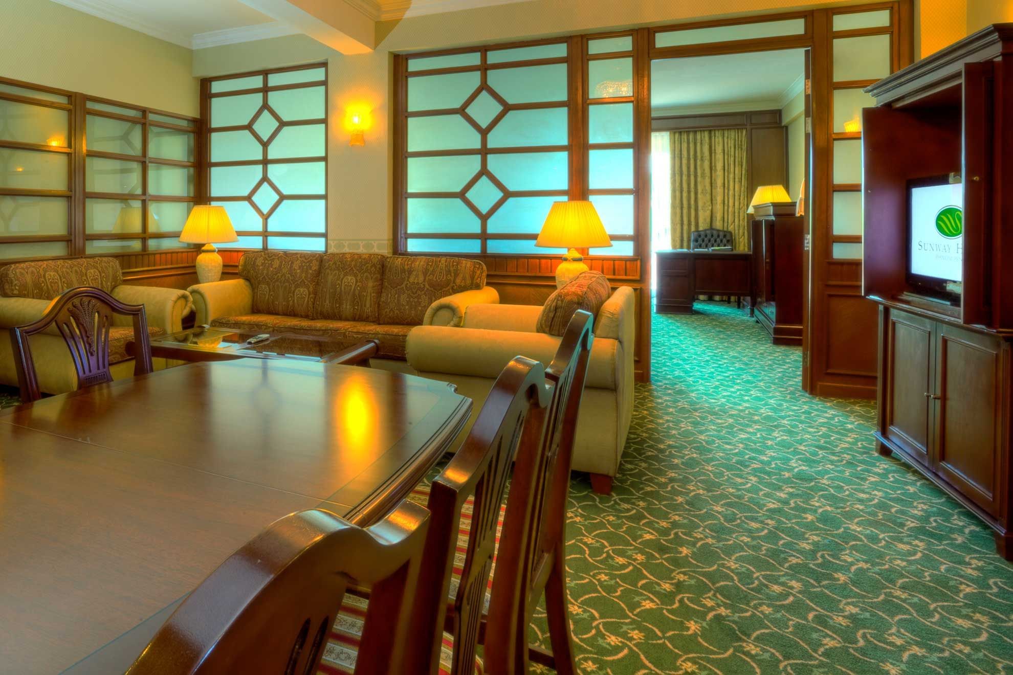 Presidential Suite Living Room with carpeted floors at Sunway Hotel Phnom Penh