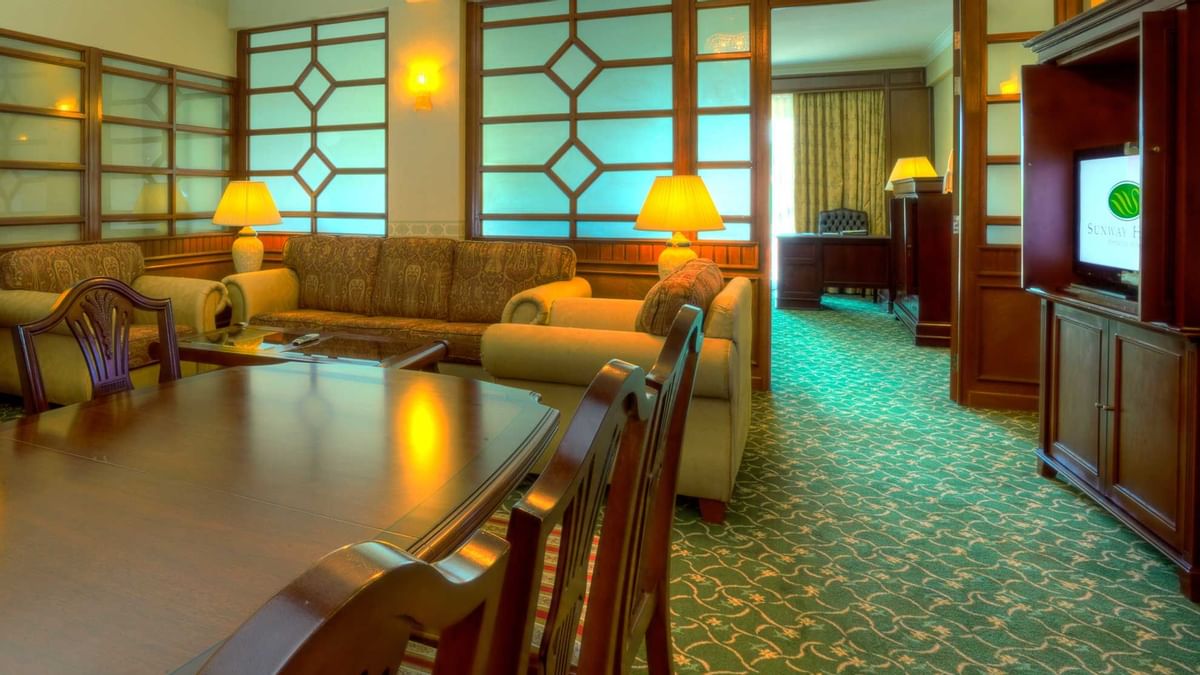 Interior of separate living & sleeping areas with city view in Two Bedroom Family Suite at Sunway Hotel Big Box