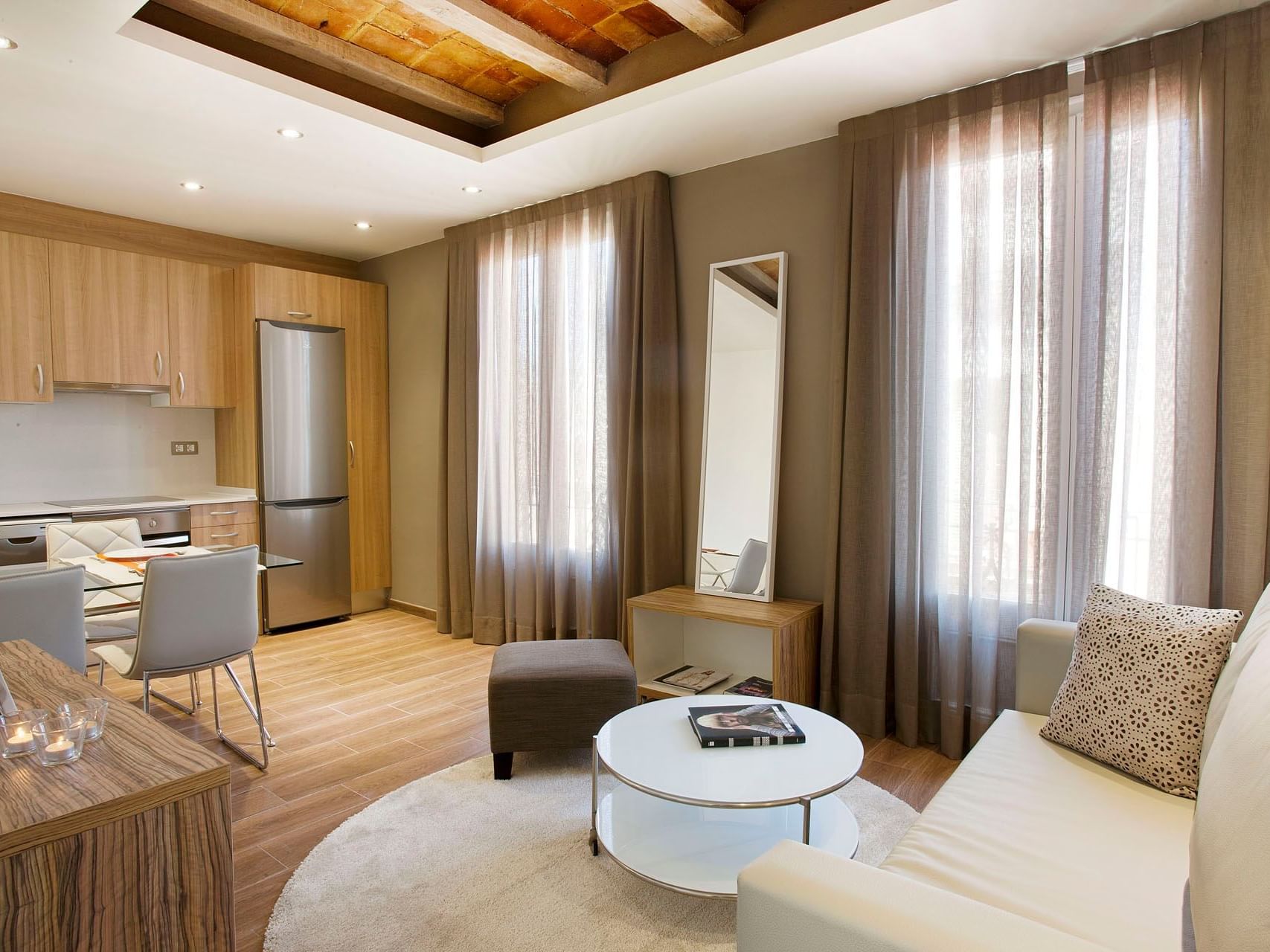 Dining & living area in Executive room at Barcelona Apartment