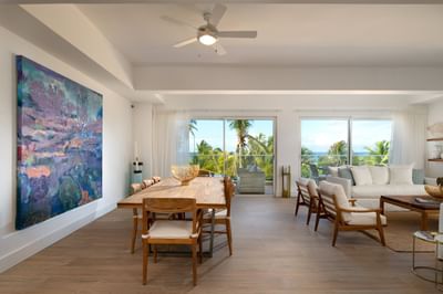 Dining, living area & a balcony in apartment at Club Hemingway