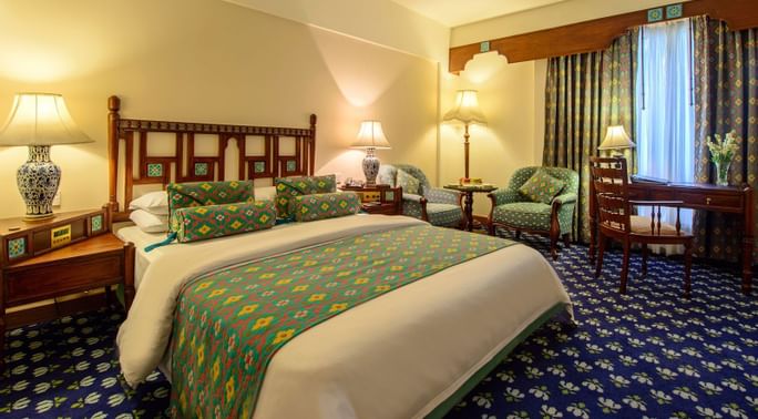 Bedroom area in Executive Room at Faisalabad Serena Hotel