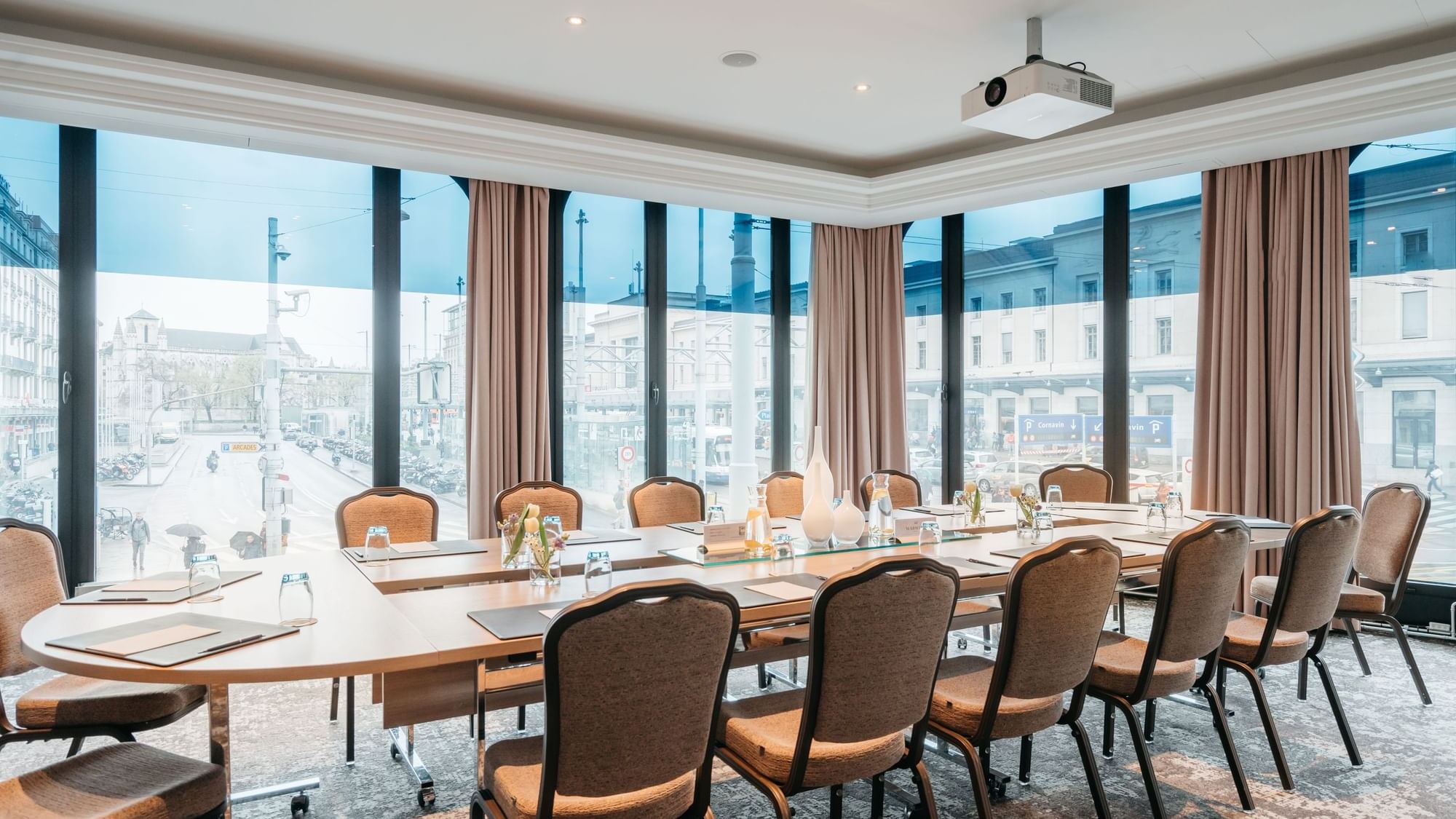 Conference table set up for a meeting arranged in Rigi at Warwick Geneva