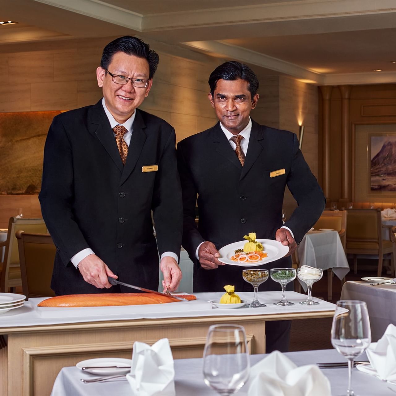 Two waiters posing to the camera at Goodwood Park Hotel