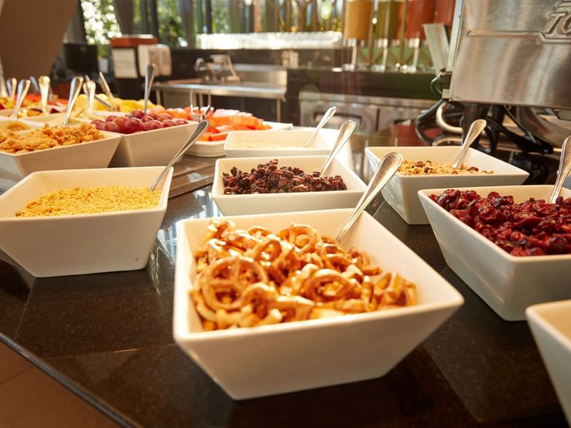 Various food plates arranged in the dining area at Fiesta Americana