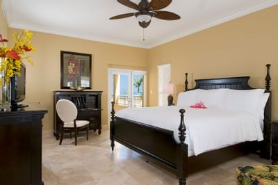 Bed with white beddings in 2 Bedroom Suite at Windsong Resort On The Reef