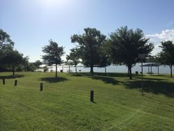 park with large grass lawn and trees