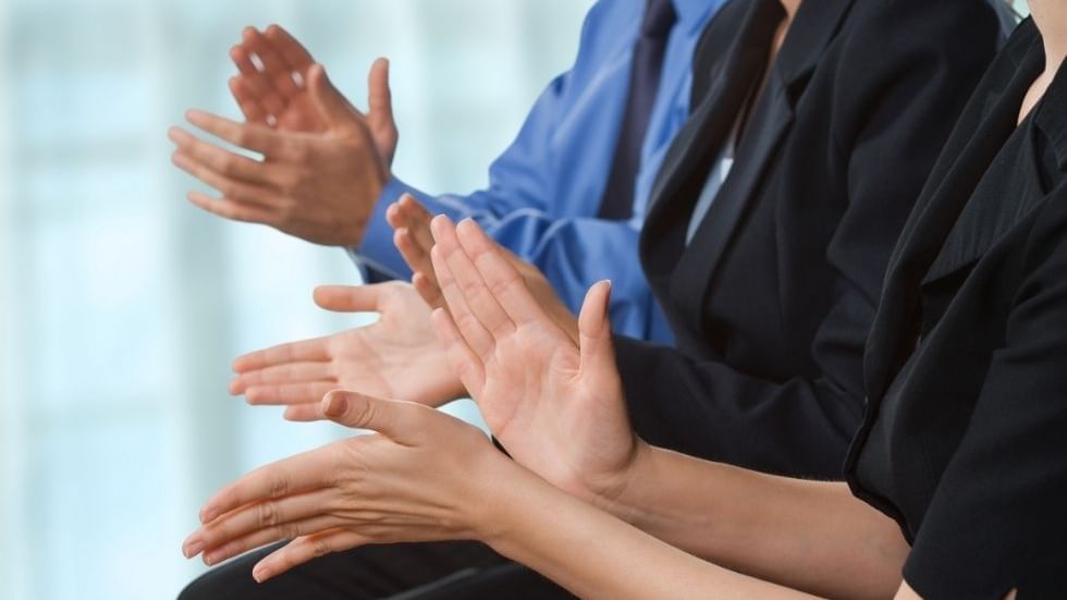 A row of people clapping their hands at Sunway Hotel Big Box