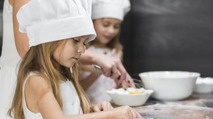 A young girl participating at the Little Chef program by Hotel Barsey by Warwick