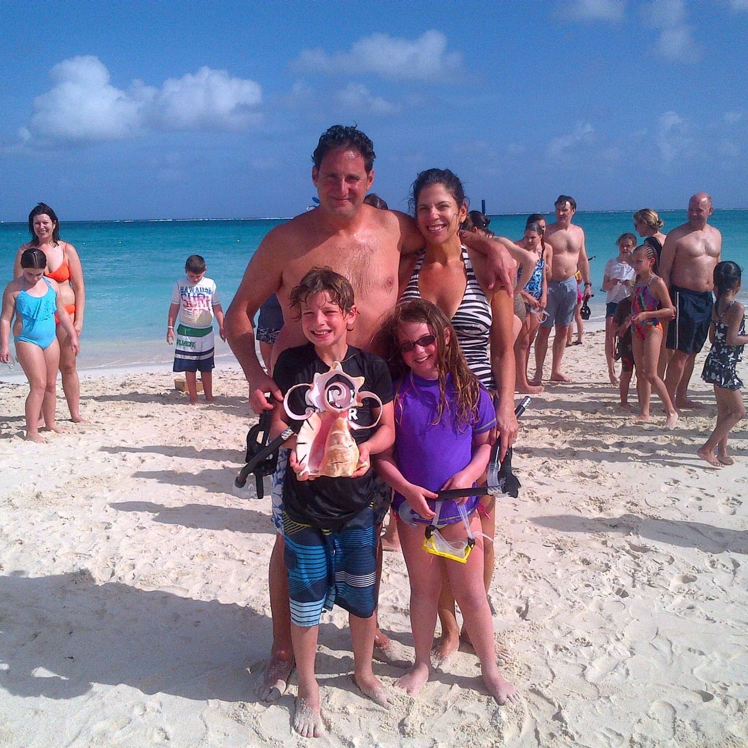 Family at the beach near The Somerset On Grace Bay