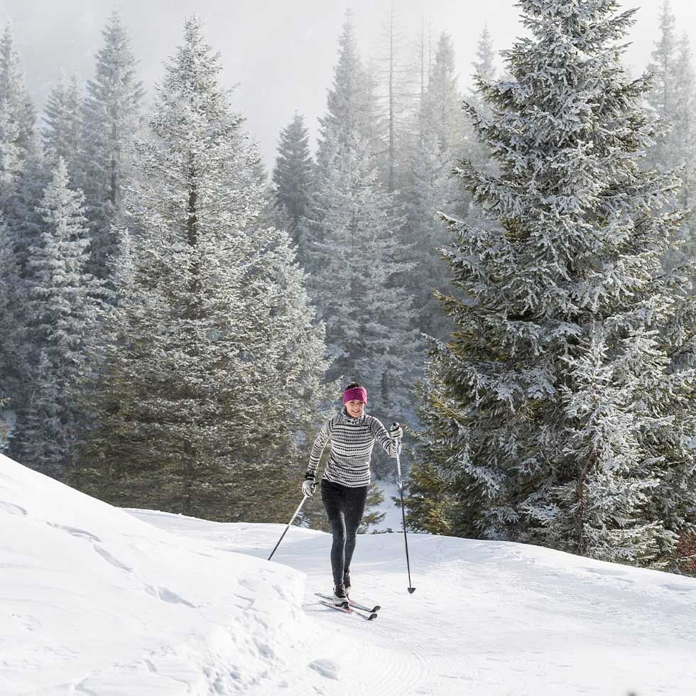 A girl while cross-country skiing near Falkensteiner Hotels