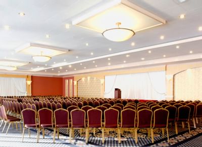 Theater set-up for an event in Solarium Hall at Honor’s Haven Retreat