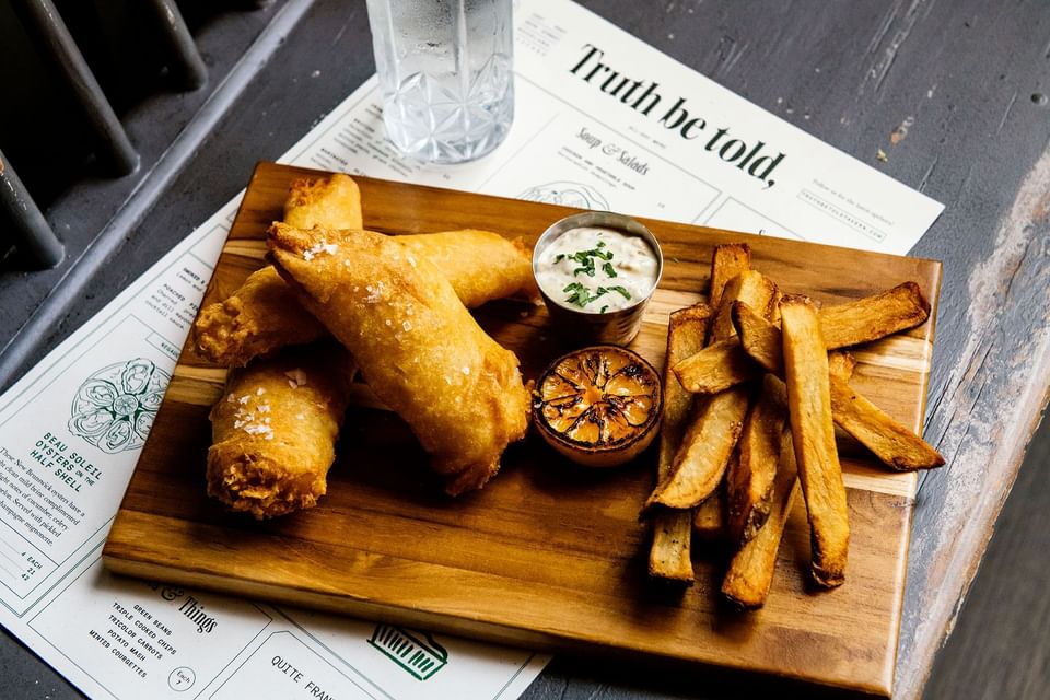 Truth Be Told served fish and chips in The Study at University of Chicago