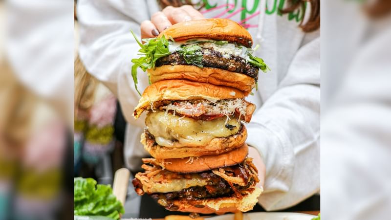 Close-up of a large burger at Sunway Hotel Pyramid