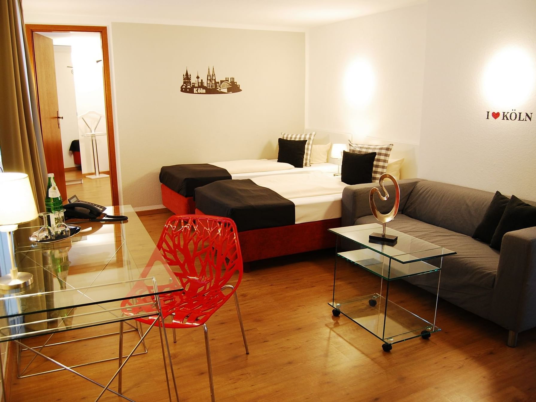 Living area and bedroom in the Studio at Rheinland Hotel Kollektion