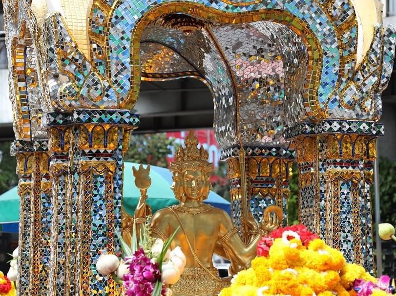 Buddha statue in Erawan temple near Okura Prestige Bangkok