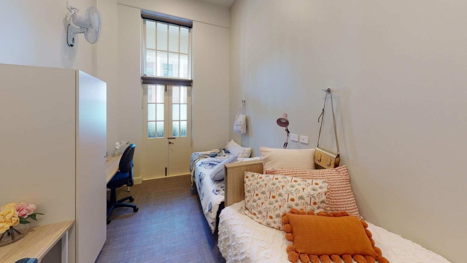 Twin Room with two beds, two desks and balcony at UniLodge Herston.