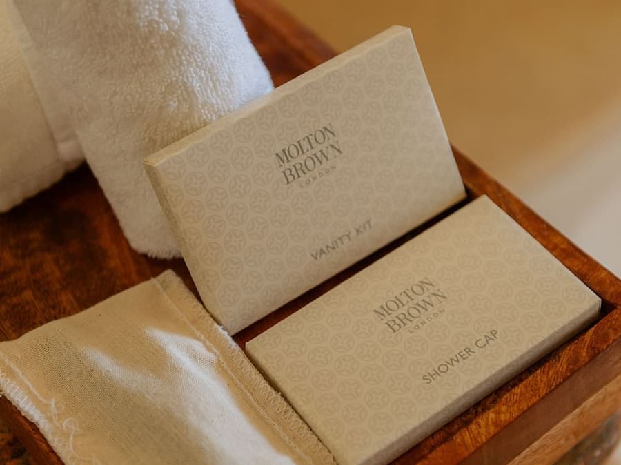 Close-up of Molten Brown brand vanity kit and shower cap in Junior Suite Ocean View Double at Marquis Los Cabos Resort