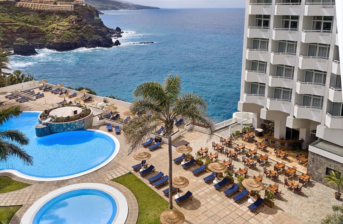 Pools and sun terrace overlooking the ocean