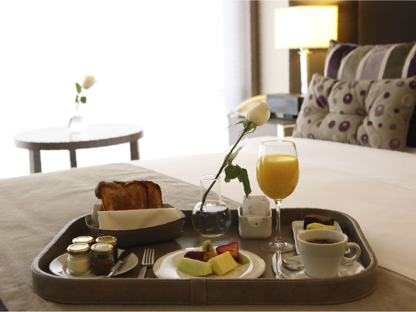 Breakfast tray served on the bed at Grand Hotels Lux