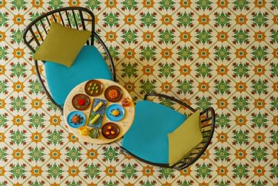 Top view of a 2 seater table with dishes at The Danna Langkawi
