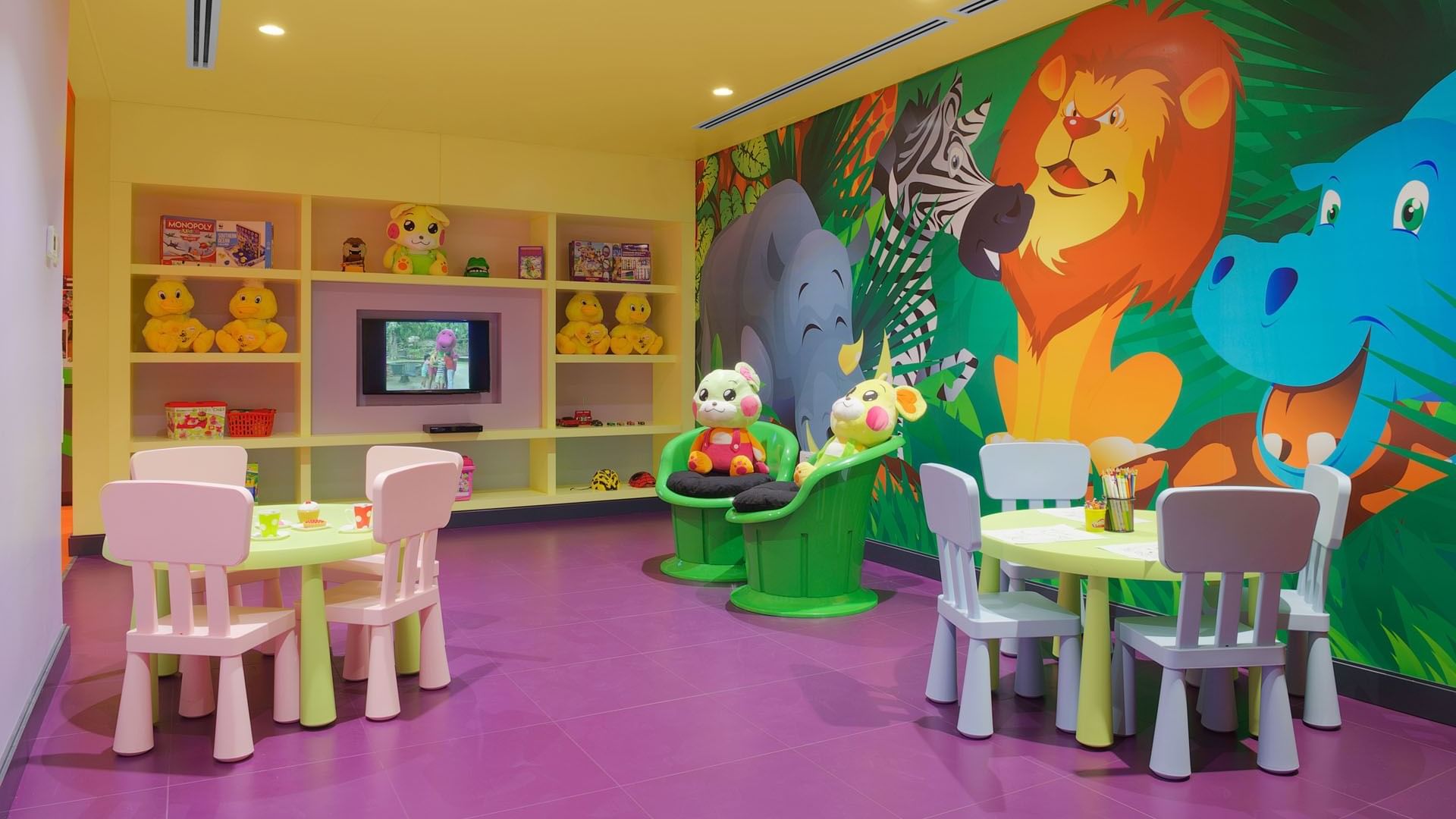 Colorful jungle themed kids' play area at DAMAC Maison Canal Views