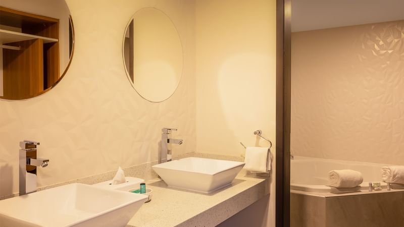 Bathroom vanity with bath tub at Gamma Ciudad Juarez
