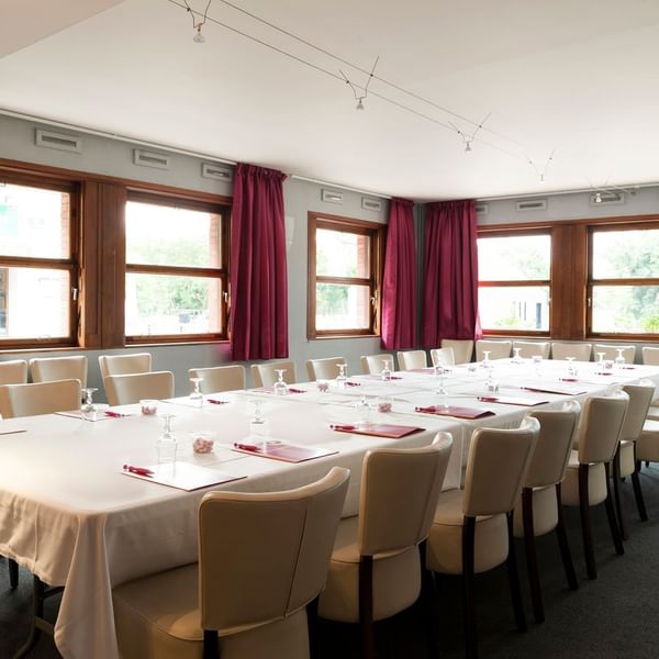 Table arrangement in a meeting room at Originals Hotels