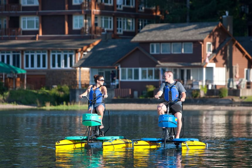 Couple enjoying Sea bikes at Alderbrook Resort & Spa