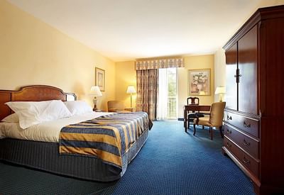 King bed & desk in Standard Guest Rooms at Trianon Bonita Bay