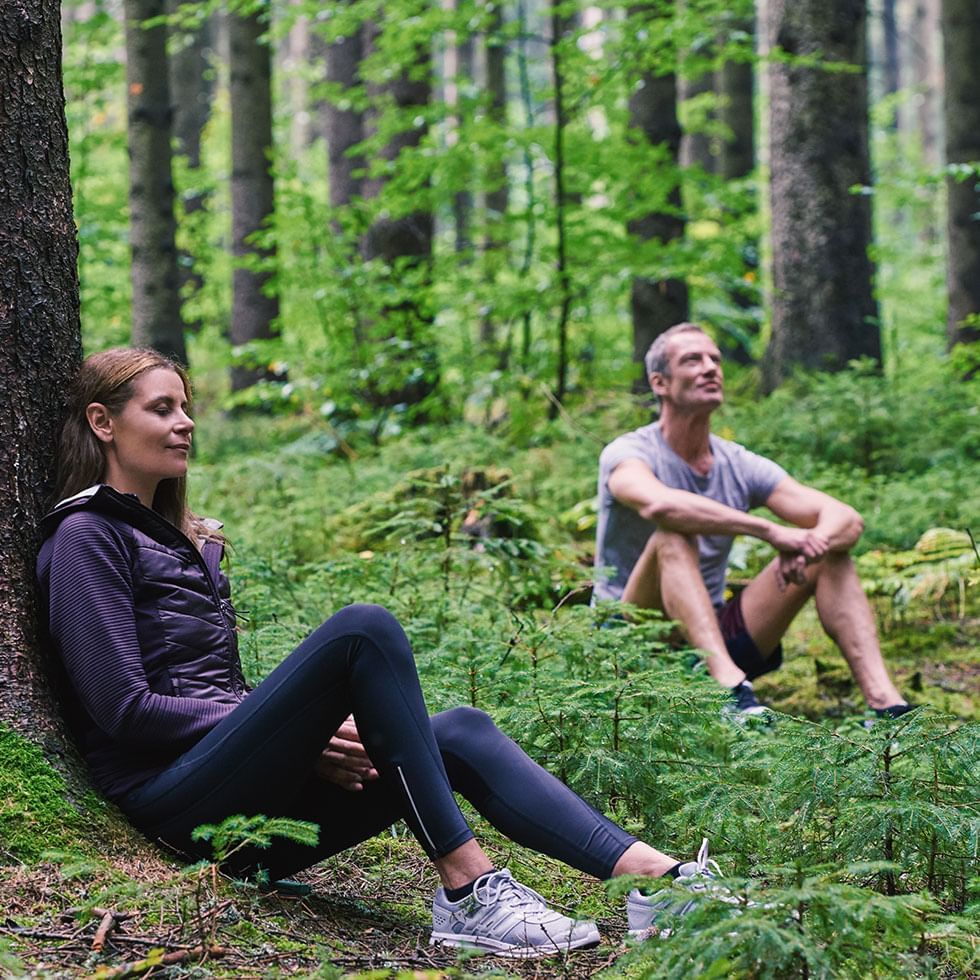 Couple exploring the nature of Forest Near Falkensteiner Spa Resort Mariánské Lázně