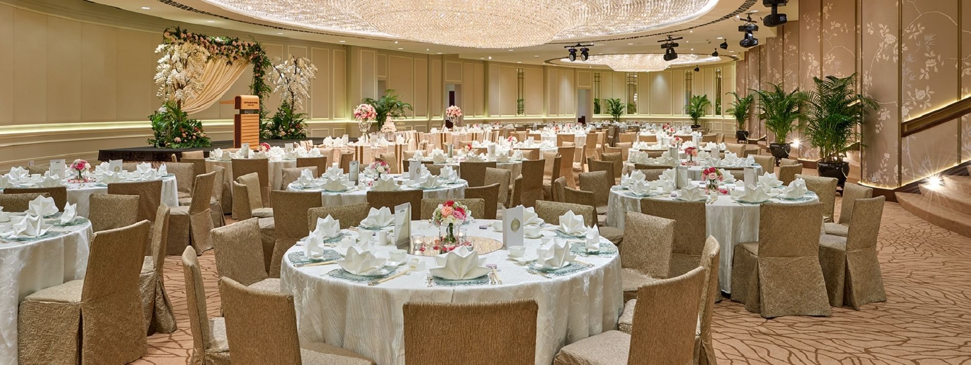 The arranged Ballroom with white tables at Fullerton Group