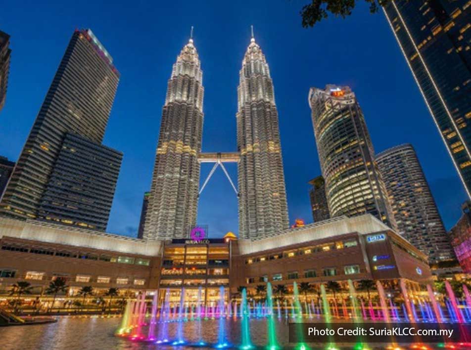 Fountain display at night at The Petronas Twin Towers, an engaging focal point near Imperial Lexis Kuala Lumpur