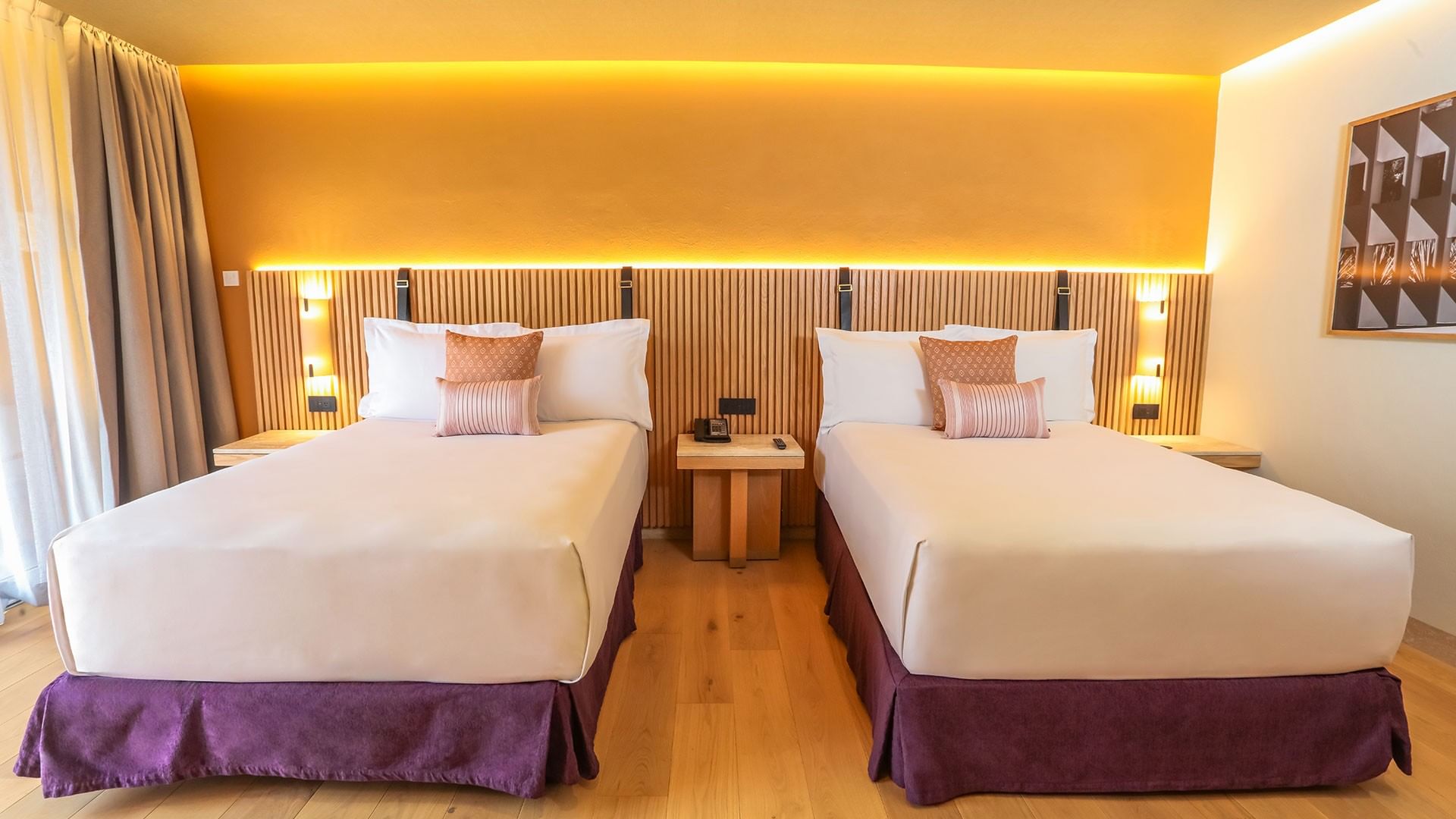 Double beds in 2 Double Superior Camino Real Club Garden View with textured wood wall features at Camino Real Polanco Mexico