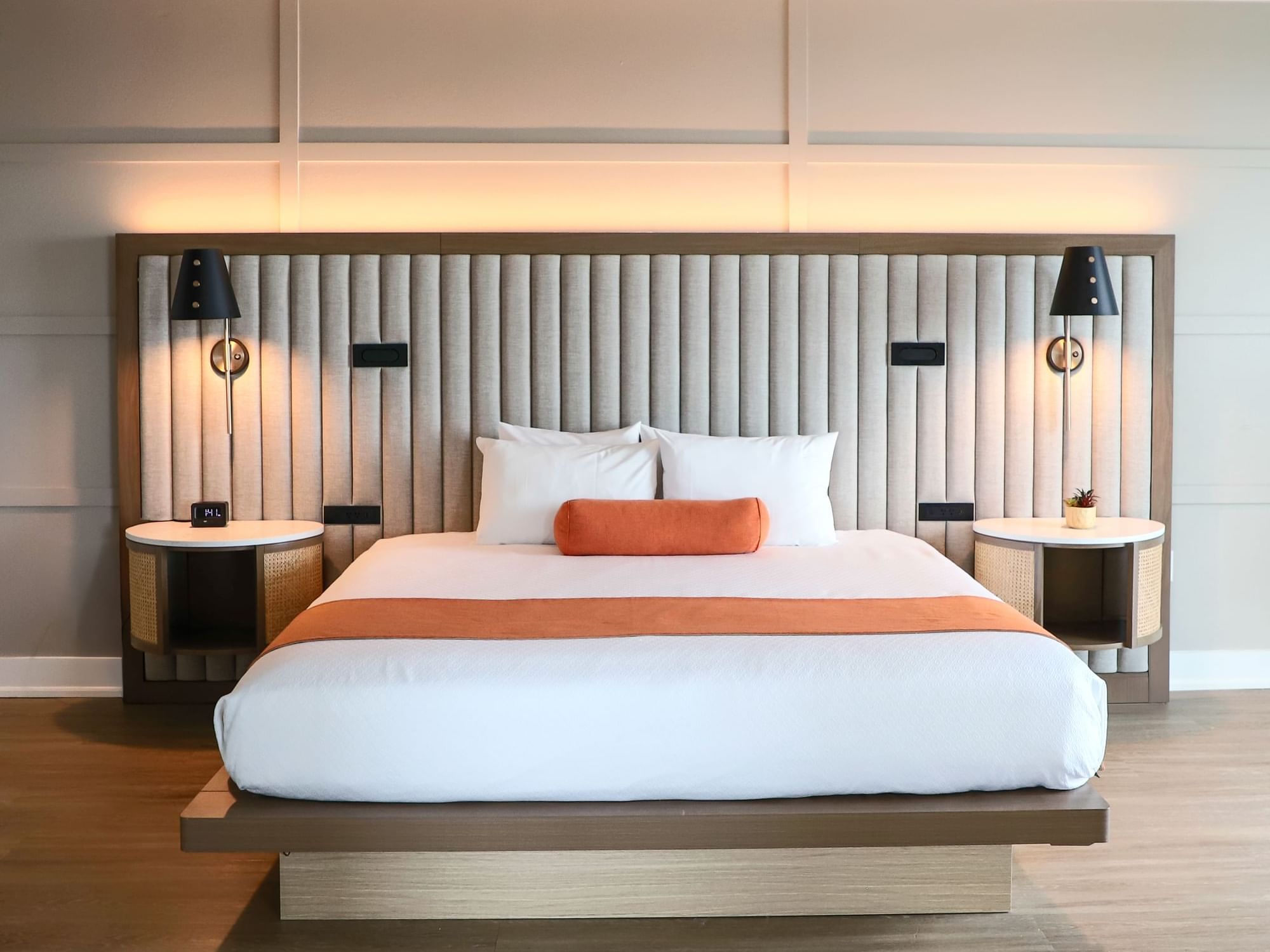 ADA Compliance Rooms featuring a spacious bed, stylish lamps, and elegant nightstands at Riverside Hotel Fort Lauderdale