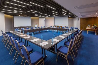 Conference room with U-shaped table setup at Villa Premiere Boutique Hotel & Romantic Getaway