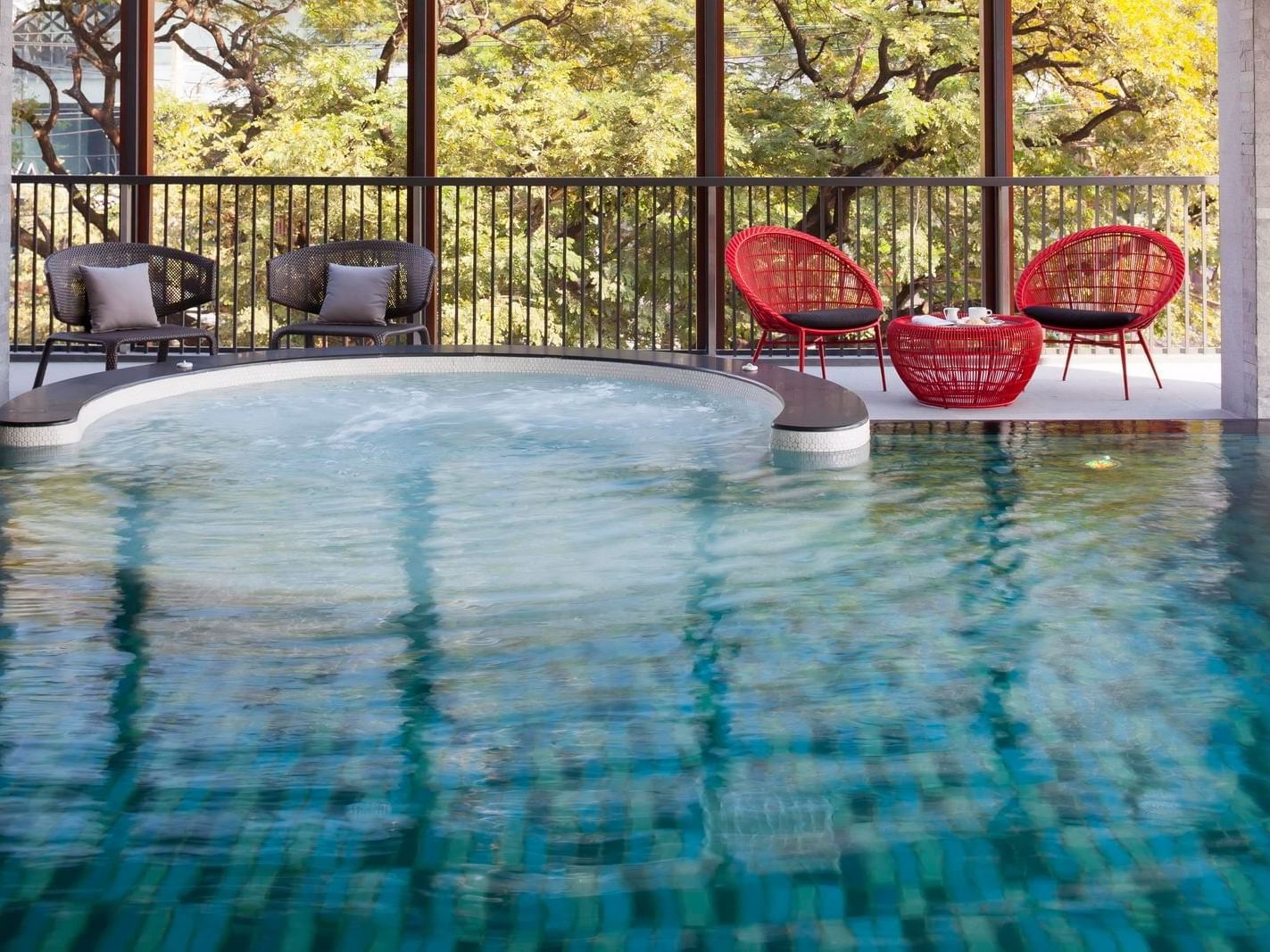 Interior of outdoor swimming pool at Eastin Tan Hotel Chiang Mai