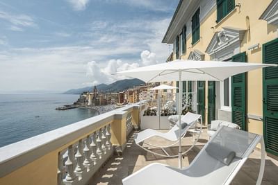 2 Loungers & Patio umbrella on terrace at Sublimis Boutique Hotel Camogli