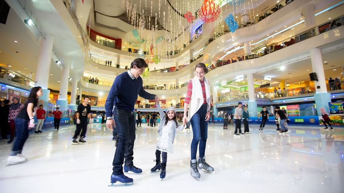 Family at ice skating rink near Sunway Hotel Pyramid