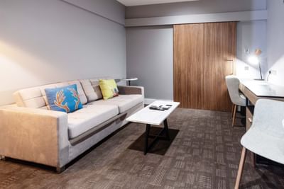 The living area in a room at the Sandman Signature Aberdeen Hote