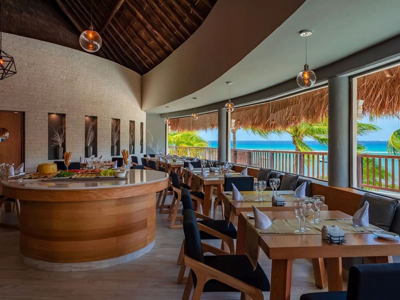 Restaurant overlooking the beach at the Reef Coco Beach