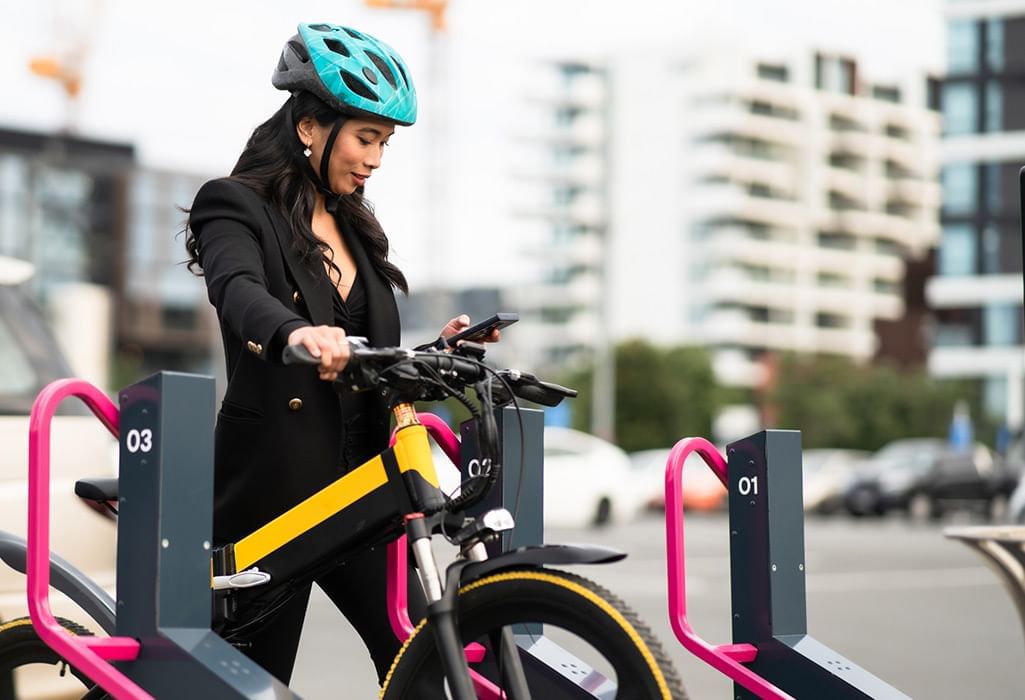 woman at e-bike station