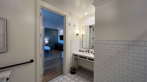 Bathroom interior with patterned floors in King Room With Balcony at Camp Creek Inn