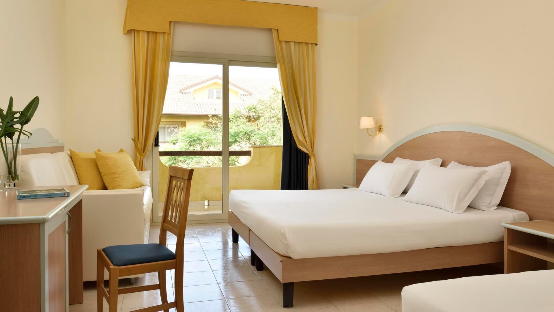 Bed & balcony, Family Room Comfort at Falkensteiner Hotels